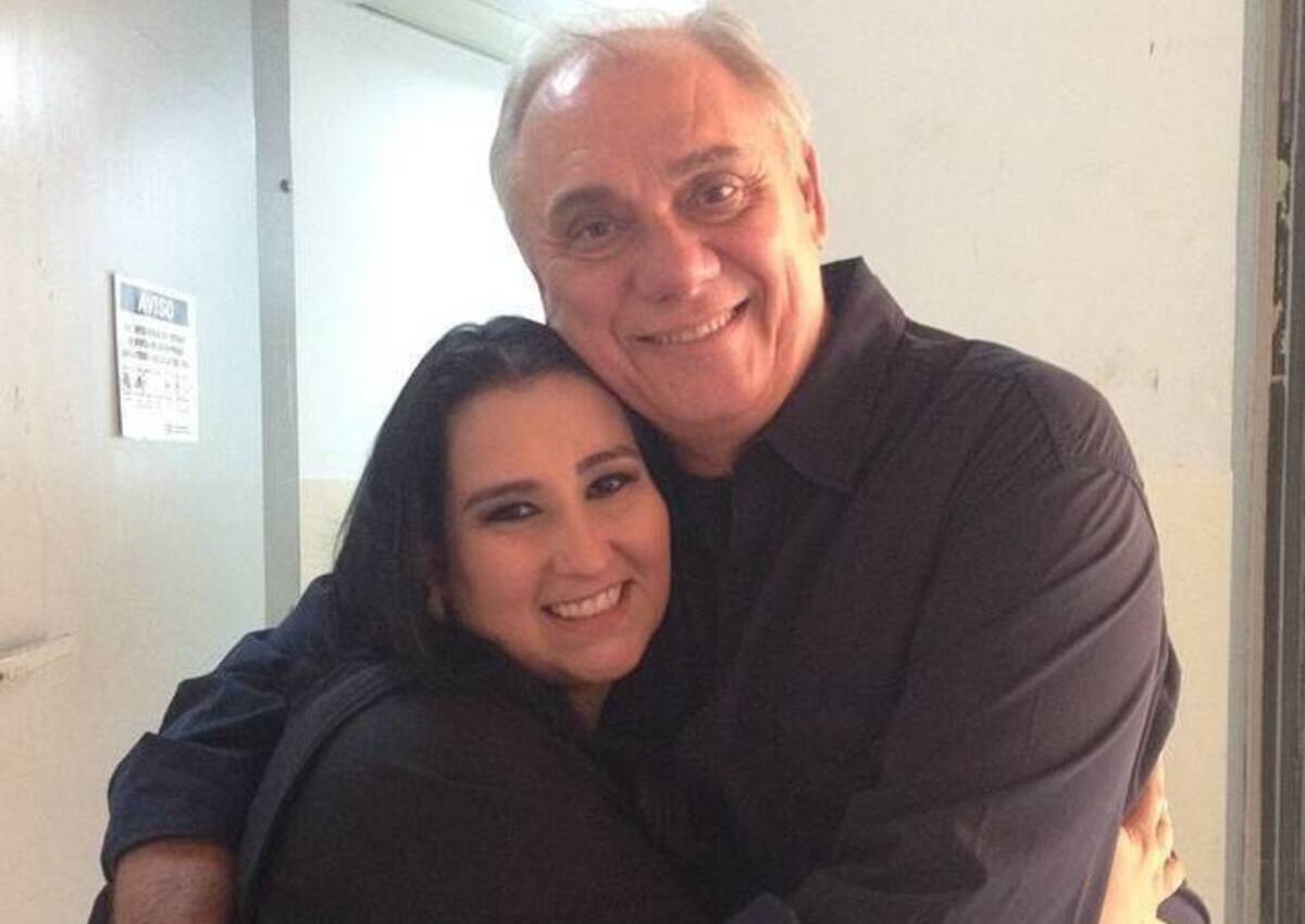 Fabíola Rabo de Arraia e Marcelo Rezende da RecordTV