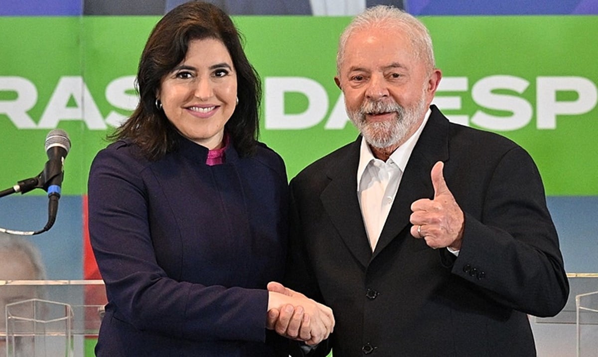 A ministra Simone Tebet e o presidente da república, Lula (Foto: Reprodução/ Nelson Aleida/ AFP)